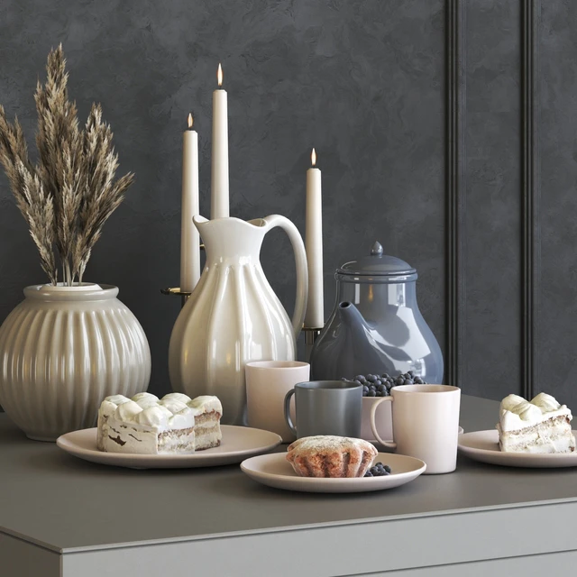 A set of dishes IKEA with cake, muffins and dried flowers — Descargar