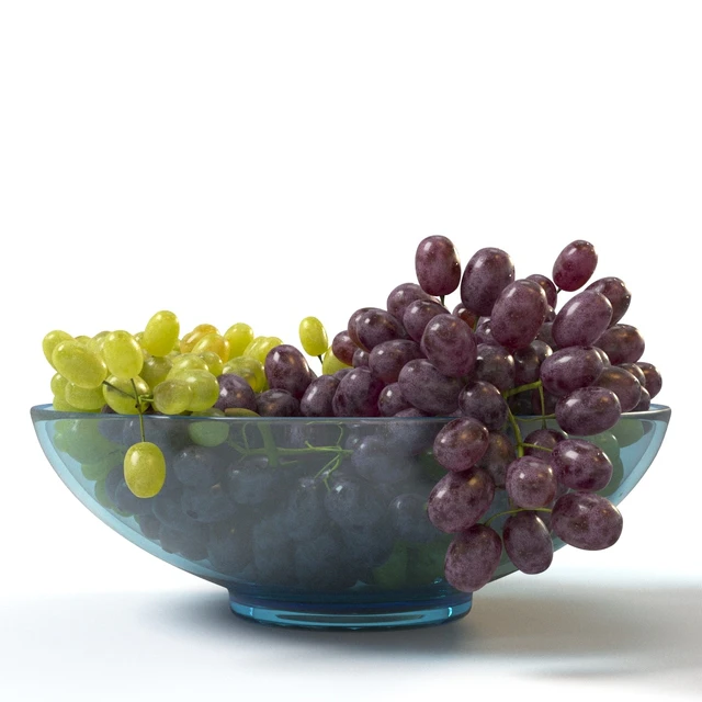 Bunches of grapes in a glass bowl — Descargar