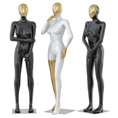 Three female mannequin with a golden face 41 — Вид 1