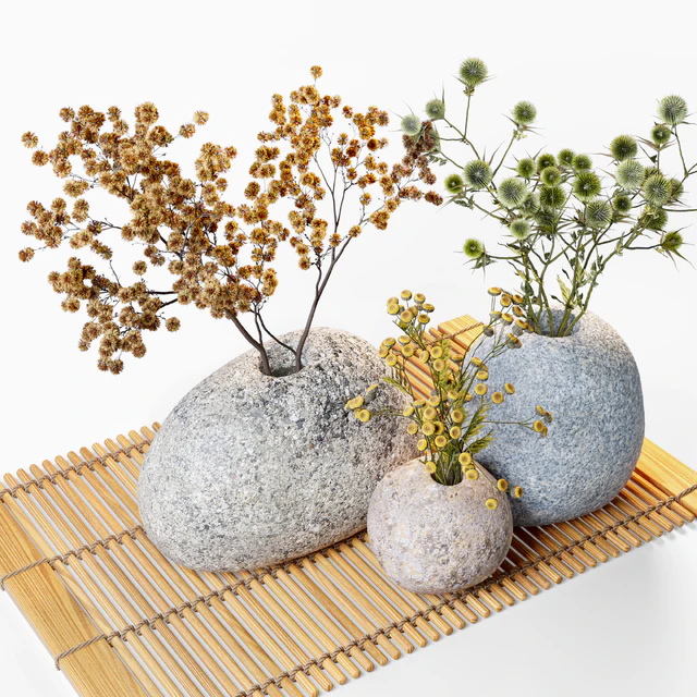 Dried flowers in stone vases — Download