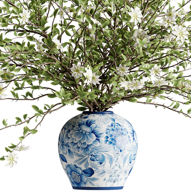 A bouquet of tree branches inserted into a celadon ceramic pot — Descargar